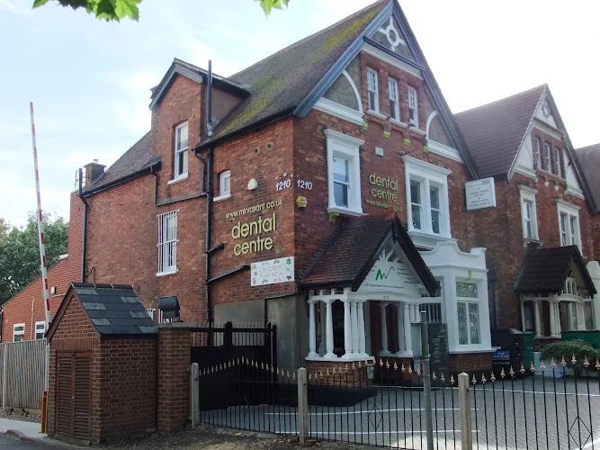 The Dentists - MK Vasant MBE and Dental Associates - Dental implants periodontist in London